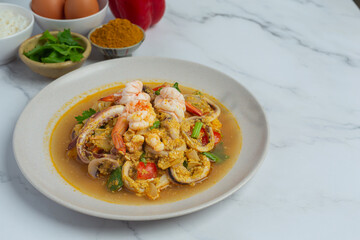 Stir-fried with mixed seafood, served with steamed rice, Thai food.