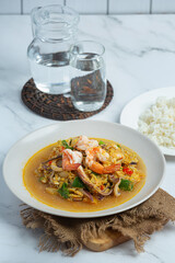 Stir-fried with mixed seafood, served with steamed rice, Thai food.
