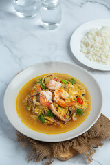 Stir-fried with mixed seafood, served with steamed rice, Thai food.