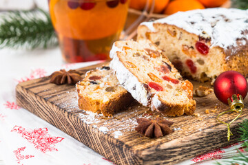 Stollen traditional Christmas ftuitcake with dried fruit and nut
