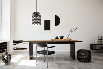 Stylish dining room interior with design wooden family table, black chairs, teapot with mug, mock...