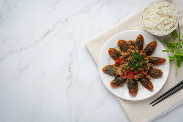 Stir Fried Basil with Spicy Century Egg Served with steamed rice and chili fish sauce, Thai food.