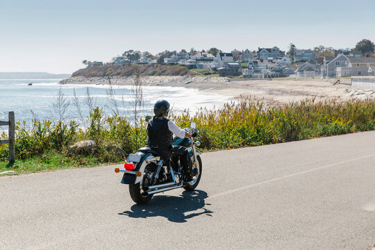 Motorcycle Rider by the coast