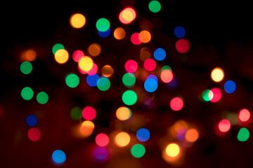 Festive blurred bokeh background, bright circles, defocused, lights