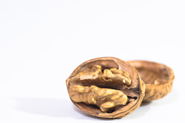 Walnut in shell on white background
