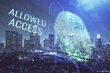 Double exposure of finger print hologram and cityscape background. Concept of personal security.
