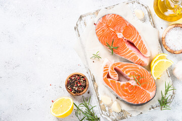 Salmon steak fresh fish with spices top view.