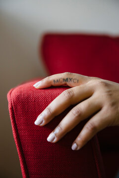 Tattoo of Roman Numeral on Index Finger on Hand
