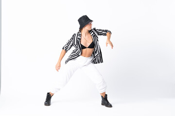 Woman dancing over isolated white background