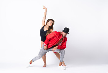 Couple dancing over isolated white background