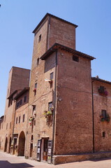 Fototapeta na wymiar Palaces and towers in the ancient medieval village of Certaldo, Tuscany, Italy