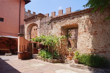 Courtyard of a palace in the ancient medieval village of Certaldo, Tuscany, Italy