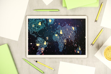 Top view of modern digital tablet screen with social network icons concept and world map. Networking concept. 3D Rendering