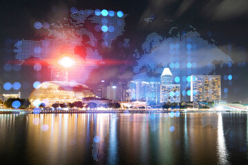 Hologram of Earth planet map on night panoramic cityscape of Singapore, Asia. The concept of international companies. Multi Exposure.