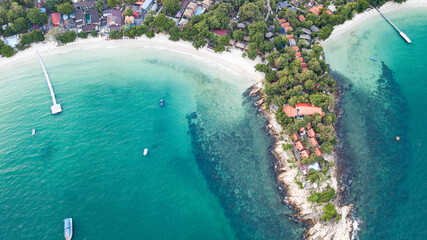 Sea aerial view, The color of the water and beautifully bright. The beach with rocky mountains and clear water of Thailand ocean on a sunny day. Landscape background.