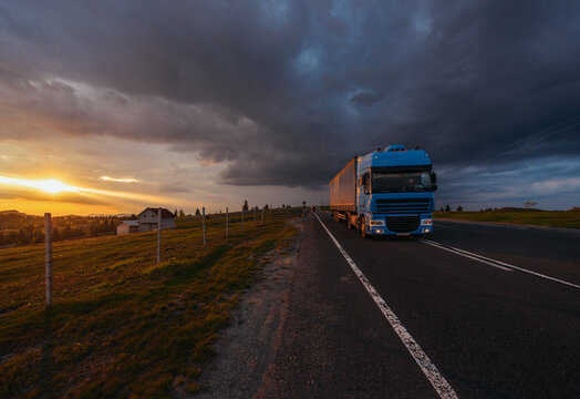 Blue Semi Truck Moving On The Road