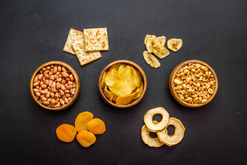 Pattern of snacks mix top view - nuts and dried fruits