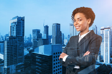 Smiling black African American business woman in suit in crossed arms pose. Bangkok cityscape. The concept of woman in business. Investment fund. Double exposure.