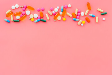A lot of colorful medication pills drugs, top view