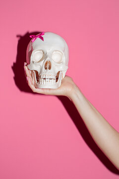 Skull with pink strap