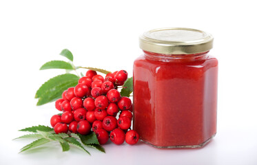 Jam from red rowan on a white background