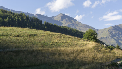 Golden light on a hill near Lignod, Aosta, with Mount Facciabella in background