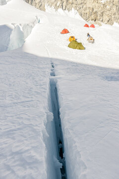 Deep Crevice in the ice close to a mountaineering basecamp