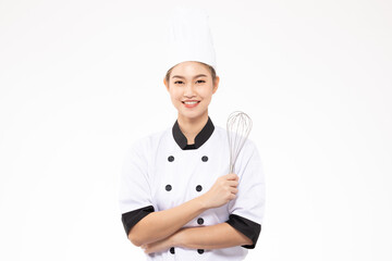Beautiful Asian chef woman smile and holding Stainless balloon whisk isolated on white...