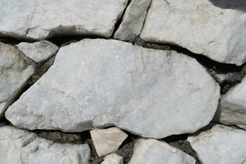 Natural background of light marble with a non-uniform texture