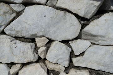 Natural background of light marble with a non-uniform texture
