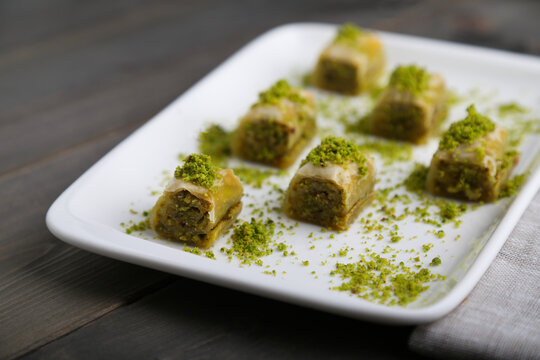 Dolama Baklava with pistachio on a white plate