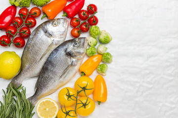 Raw fish with colorful vegetables.