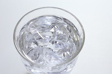 water with ice cubes in glass