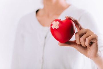 World health day, Healthcare and medical concept.Female  holding red heart