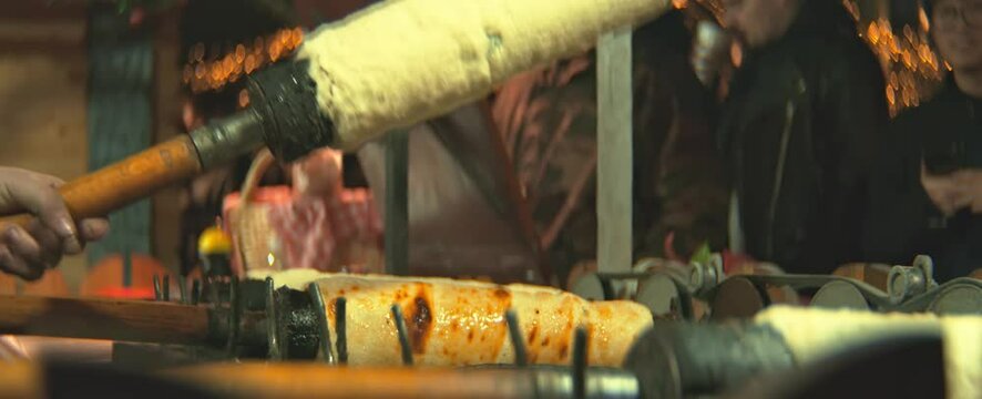 Kurtos Kalacs Being Cooking and Sold at local Holiday Fest Baking Traditional Hungarian Cake