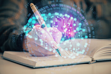Multi exposure of woman's writing hand on background with brain hologram. Concept of brainstorming.
