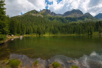 Fototapeta na wymiar Panoramic view of San Pellegrino lake in Val di Fassa, Trentino Alto-Adige, Italy