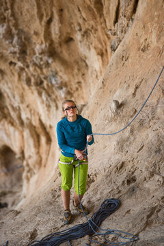 Young female belaying