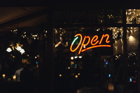 Neon sign open on a cafe window