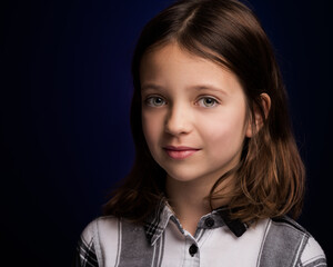 Portrait of a beautiful young girl outdoors