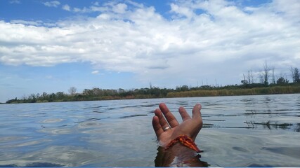 A beautiful climate with a river and a blue sky