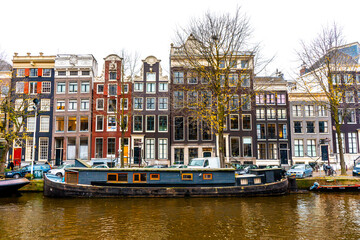 Fototapeta na wymiar Nice buildings around canal in Amsterdam , Netherlands - 26 November