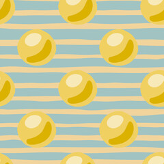 Yellow abstract pearl silhouettes seamless doodle pattern. Marine artwork with simple ornament and blue stripped background.