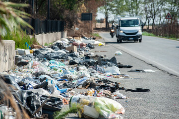 Garbage heap along a road, near Rome, Italy. Environmental degradation concept