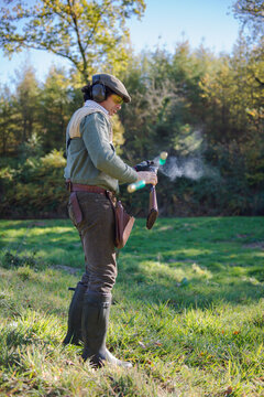Cartridges coming out of a shotgun in a duck hunt