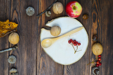 autumn background frame apples acorns rowan walnuts leaves still life top view copy space text