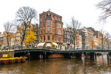 Beautiful buildings and the bridges around canal in the center of Amsterdam