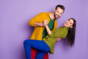 Profile photo pretty lady handsome guy couple hugging holding hands have fun slow dancing good mood quarantine time wear casual shirts trousers isolated purple color background
