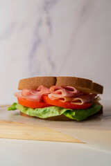 Sandwich jam tomato lettuce bread