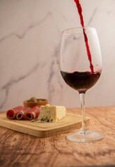 Wine with jam and cheese